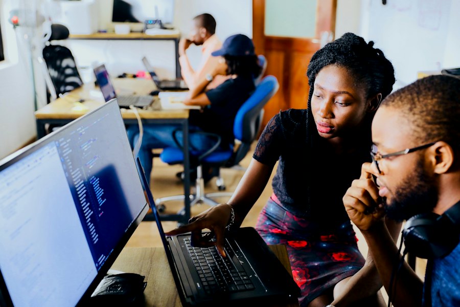 A learner studying an online course on a laptop