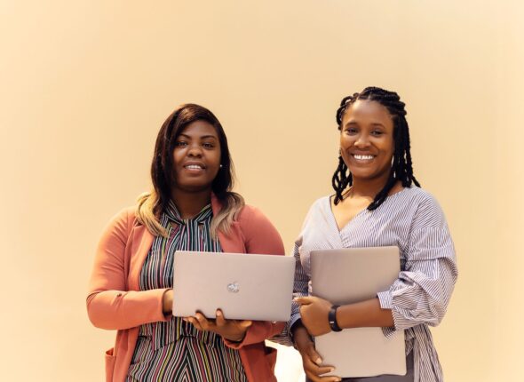 confident african businesswomen collaborating in lagos office